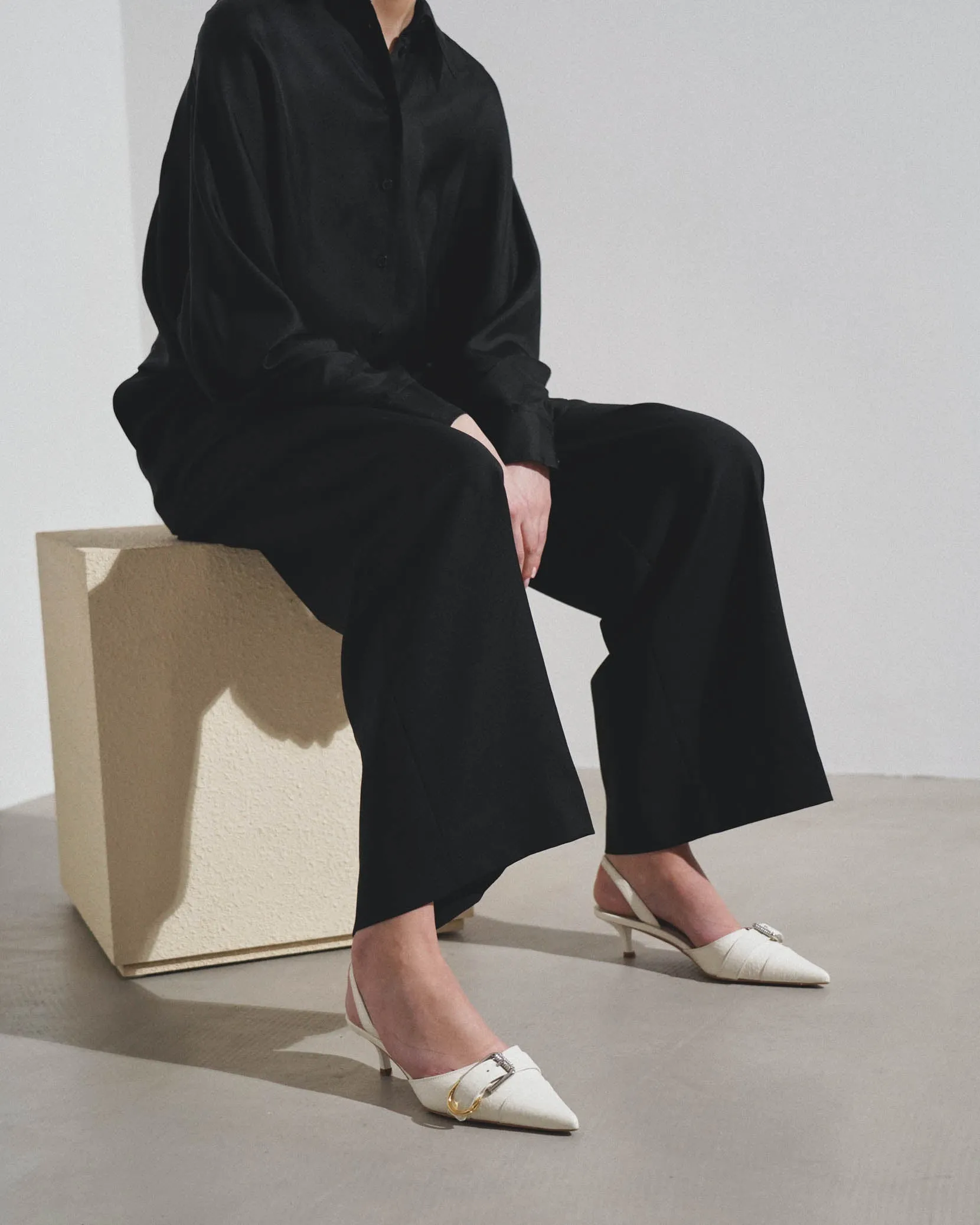 Voyou white slingbacks