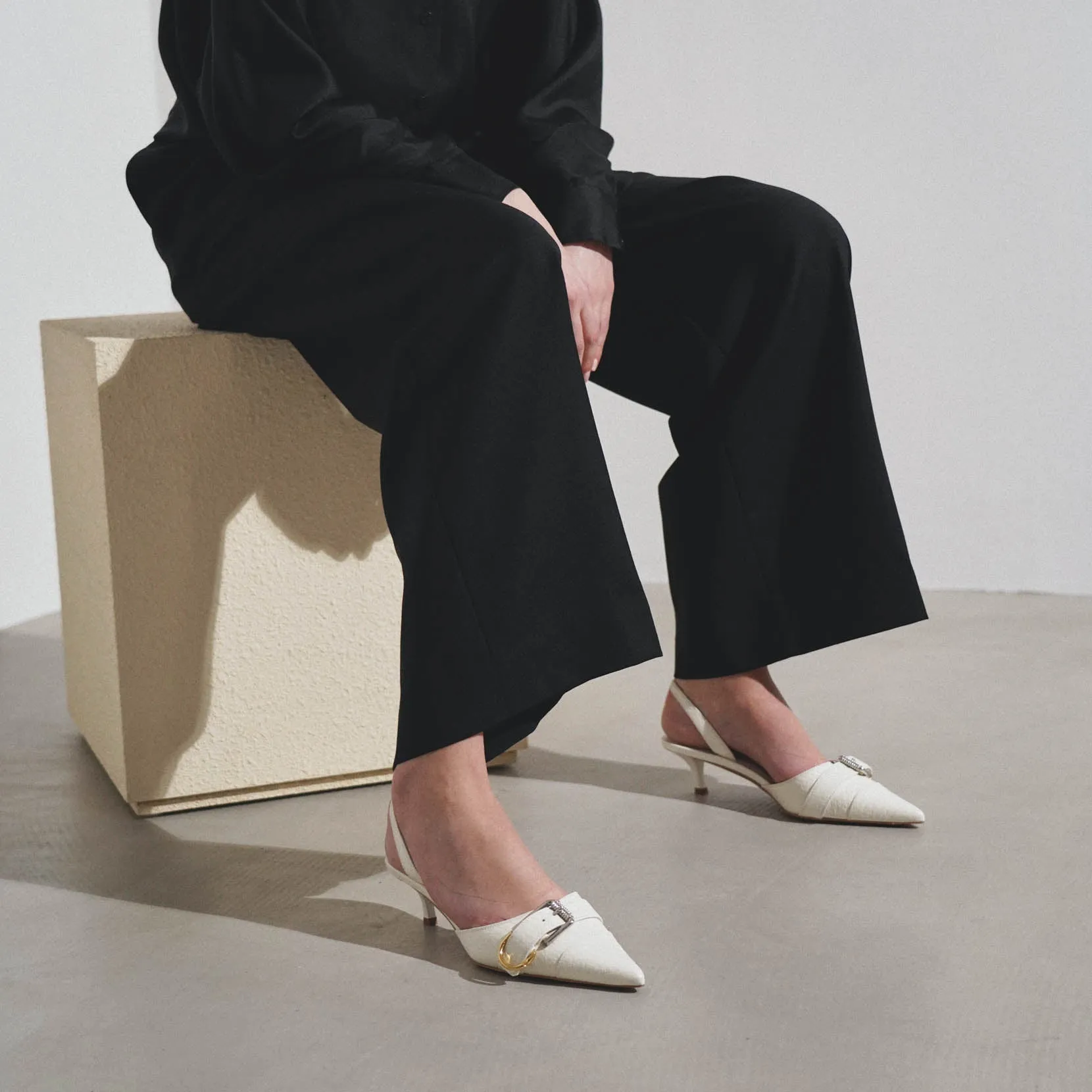 Voyou white slingbacks